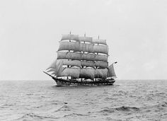 an old photo of a sailboat in the ocean