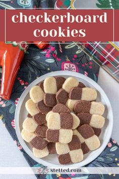 a white plate topped with cookies on top of a table