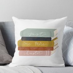 three books stacked on top of each other throw pillow