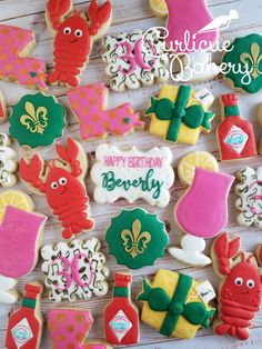 decorated cookies are displayed on a table