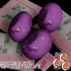 three purple apples sitting on top of each other next to some pink paper and money