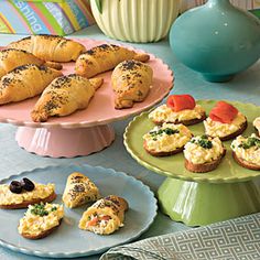 there are many different types of pastries on the plates and trays next to each other