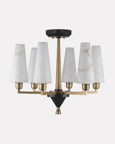 a brass chandelier with marble shades and black metal fittings, on an isolated white background