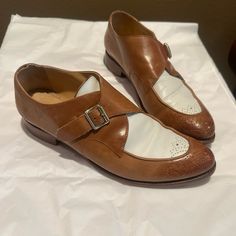 Women’s Oxford. Brown & White Italian Polished Leather. 1” (25mm) Heel. Leather Sole And Soft Lining With Cork Midsole That Forms To Your Foot White Wingtip Dress Shoes, White Leather Shoes With Plain Toe And Leather Footbed, White Leather Shoes With Round Toe And Leather Footbed, White Leather Shoes With Leather Footbed, White Cap Toe Dress Shoes With Brogue Detailing, White Leather Shoes With Removable Insole, White Fitted Almond Toe Dress Shoes, White Leather Cap Toe Shoes, White Cap Toe Leather Shoes