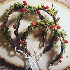 This Christmas Garland headband is a perfect holiday accessory for Christmas photo shoots, holiday parties, or any festive celebration!   The Christmas tiara is made from sturdy, flexible wrapped garden wire, with faux pine garland and holiday greenery with faux red holly berries accents. The ends of this rustic Christmas tiara are wrapped for comfort. This beautiful holiday crown is flexible and can be gently bent and shaped to the wearer's head for the ideal fit. Christmas Tiara, Mistletoe And Wine, Handmade Flower Crown, Merry Berry, Christmas Photo Props, Flower Crown Hairstyle, Newlywed Christmas, Holiday Greenery