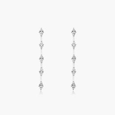 14K White Gold Luminance Lab Created Diamond Drop Earrings. Curate your collection of classic accessories with these eye-catching drop earrings. Fashioned in 14K white gold,each drop features an elongated bar lined with lab created diamonds. Lab-created diamonds and a brilliant buffed luster, these earrings secure with push backs. White Dangling Earrings, White Gold Teardrop Linear Earrings Fine Jewelry, White Gold Teardrop Linear Earrings, Classic Long Drop White Gold Diamond Earrings, White Brilliant Cut Drop Earrings, Formal White Gold Drop Linear Earrings, Formal White Gold Linear Drop Earrings, Classic Diamond White Linear Drop Earrings, Timeless White Drop Earrings