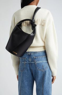 Jacquemus Le Petit Tourni Leather Bucket Bag | Nordstrom Cheap Minimalist Women's Bucket Bag, Jacquemus 2022 Bag, Luxury Formal Crossbody Bucket Bag, Black Bag Bucket, Luxury Pouch Bucket Bag With Branded Hardware, Luxury Black Bucket Bag, Thick Strap Bucket Bag, Channel Bucket Bags, Ysl Micro Bucket Bag