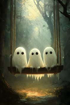 three white owls sitting on a swing in the woods