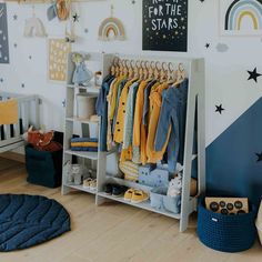 a child's room with clothes and toys