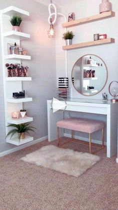 a white desk with a mirror and shelves on it in a room that has carpeted flooring