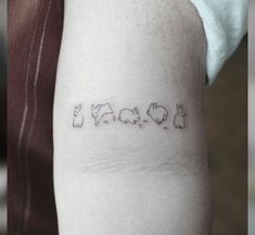 a person with a small tattoo on their arm