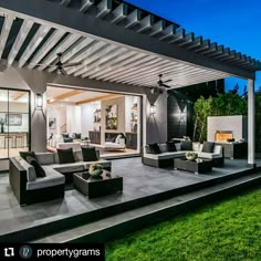 an outdoor living area with couches and chairs