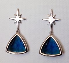 Navy Blue North Star Silver Triangle Women Earrings. PLEASE READ ITEM DESCRIPTION and SHOP POLICIES before placing your order, and contact me with any questions! EARRINGS are about 1.18 inch (3cm) long from top of earring stud to bottom. EARRINGS SECTION: https://www.etsy.com/shop/LanaChayka?ref=seller-platform-mcnav&section_id=17999866 BRIDAL EARRINGS SECTION: https://www.etsy.com/shop/LanaChayka?ref=seller-platform-mcnav§ion_id=11638940 NECKLACES SECTION; https://www.etsy.com/shop/LanaChayka?r Celestial Blue Pierced Earrings, Blue Celestial Pierced Earrings, Blue Star-shaped Jewelry For Party, Blue Clip-on Earrings For Anniversary, Blue Celestial Nickel-free Earrings, Blue Nickel-free Earrings For Anniversary, Nickel-free Blue Earrings For Anniversary, Blue Star-shaped Celestial Earrings, Celestial Blue Earrings For Party