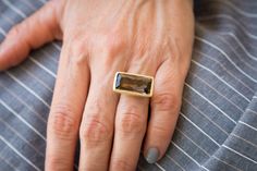 This is a rectangle ring set with smoky quartz gemstone. It is a gold big statement cocktail ring. . A gemstone, geometric Rectangle ring for women, with a simple clean design. This smoky quartz gold rectangular ring is very notable and will suit any occasion. It is a beautiful cocktai ring and will look great on a white T-shirt. It is available in 14 karat gold plated brass, and sterling silver. Buy it for your self or for a loved one. Just choose your ring number and choose between 14 karat go Rectangular Ring, Clean Jewelry, Rectangle Ring, Clean Gold Jewelry, Big Ring, Jewelry Cleaning, Smoky Quartz Ring, Purple Amethyst Ring, Diamond Necklaces