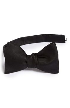 Lustrous textured silk lends classic style to a bow tie that suavely polishes any evening look. Style Name:Eton Silk Bow Tie. Style Number: 5060155. Pre-tied Satin Bow For Black Tie Events, Elegant Solid Bow Tie, Classic Pre-tied Satin Bow Tie, Classic Satin Tuxedo For Formal Occasions, Elegant Ties For Black Tie Events, Classic Pre-tied Decorative Bow, Elegant Satin Tuxedo For Party, Formal Silk Satin Bow, Bow Ties For Black-tie Events