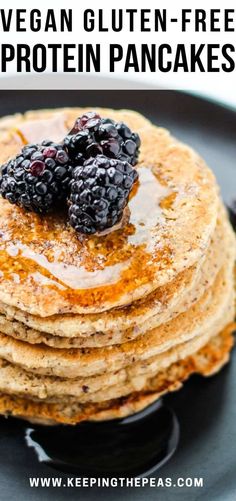 stack of vegan gluten - free protein pancakes with berries on top