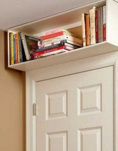 a white door with some books on it