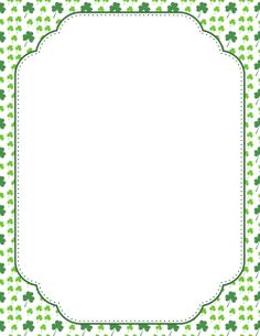 a green and white frame with shamrocks on it