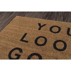 a door mat with the words you're good written in black ink on it