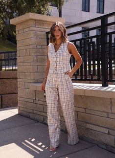 These Boucle Plaid Trousers offer both style and function. The classic plaid pattern gives a timeless touch, while the wide leg and pockets provide comfort and convenience. Elevate your wardrobe with these versatile trousers. Simple and effortless. Fabric 100% polyester Lining 95% polyester, 5% spandex V Neck Design, Plaid Trousers, Plaid Vest, Plaid Skirt, Plaid Skirts, New Tops, Plaid Pattern, Neck Designs, Dress Collection