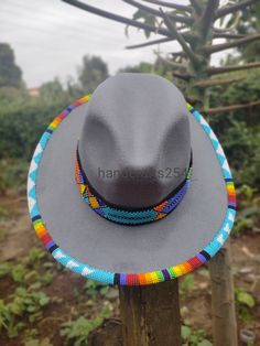 This listing is for beaded edge and brim fedora hat. The beads go around the whole edge and brim. Most hat brims are one size fits all.I have made a beautiful pattern that goes all round. Instead of having a plain fedora hat, this one is more beautiful with beads. Band height is 1 inch Circumference 57cm Beaded Mini Hat, Beaded Fedora Hat Pattern, Beaded Hat Bands Alcohol, Beadwork Designs Patterns, Beaded Hat Brim, Hat Beading, Beaded Caps, Beaded Hats, Beaded Ideas