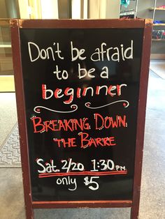 a sign that says don't be afraid to be a beginner beginning down the barrel