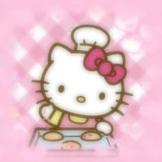 an image of a hello kitty with donuts in front of her on a pink background