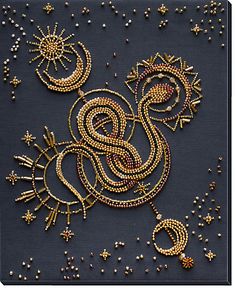 an intricately designed wall hanging with gold and silver beads on black fabric, featuring a dragon