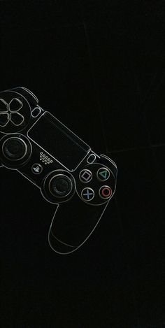 an image of a video game controller in the dark