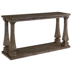 a wooden table with two pillars on top