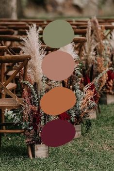 an outdoor ceremony with wooden chairs and colorful decorations on the back row, along with greenery