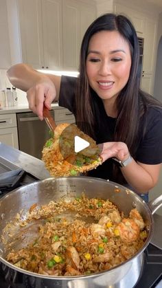 a woman is cooking food in a pan on the stove