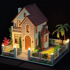 a model house is lit up at night