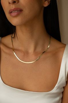 "Herringbone Gold Chain , Adjustable Gold Chain , 3mm Gold Chains , Herringbone Chain , Layering Chain , Snake Necklace , Chain For Her   This herringbone delicate necklace is perfect for everyday use. It's 14k solid gold. We also carry it in variety of widths.  The chain is also available in 14k rose and white gold. FEATURES: -Gold KT: 14K Solid Gold -Gold Color: Yellow Gold -Chain Lengths: 14\", 16\", 18\", 20\", 22\", 24\" -Chain Widths: 2mm -Chain Style: Herringbone -Clasp Closure: Lobster claw SHIPPING: -Ready to Ship in 1-2 Business Days -FREE shipping on all U.S. orders  About Zhedora:  All our work is made with love in our Los Angeles studio. When you purchase a piece from Zhedora, you can know that you're getting quality hand-crafted jewelry that's made by people who really care. Chains Aesthetic, Chain Layering, Gold Snake Chain, Herringbone Chain, Gold Aesthetic, Snake Necklace, Layered Chains, Fancy Jewellery, Yellow Gold Chain