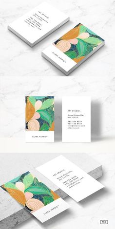 three different business cards on top of each other, with the same design and color scheme