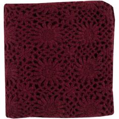 a red towel with an intricate design on it's side and the bottom part of its