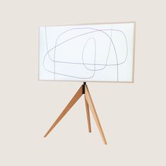 an easel with a white board on it