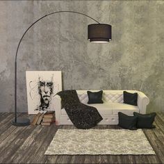 a living room with a white couch, black pillows and a large painting on the wall