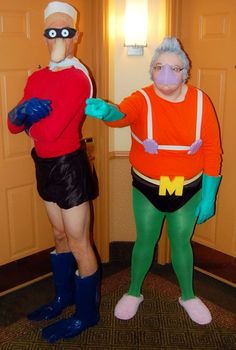 two people in costumes standing next to each other