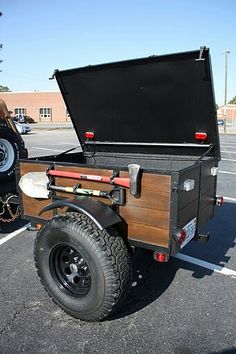 an old truck is parked in a parking lot