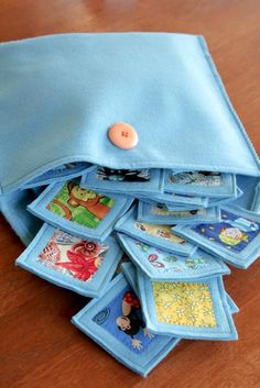 there is a blue cloth bag with buttons in it