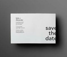 a white and black save the date brochure on a gray background with text