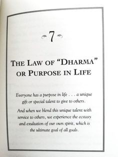 the law of dharma or purpose in life is written on an open book