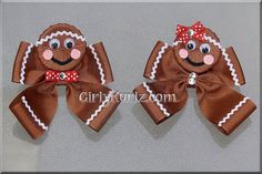 two brown and white hair bows with red polka dots on them, one has a smiling face