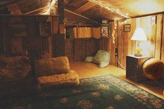 a living room filled with furniture and a lamp