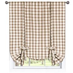 a brown and white checkered window curtain