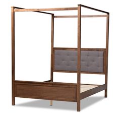 a wooden bed frame with an upholstered headboard and foot board is shown