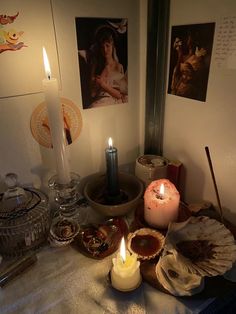 candles and other items on a table in a room