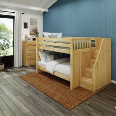 a wooden bunk bed sitting on top of a hard wood floor next to a window