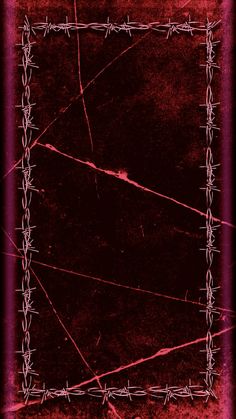 a red frame with barbed wire around it on top of a black background that looks like an old grungy photo